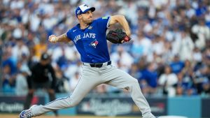 Toronto Blue Jays pitcher Max Scherzer throws against the Los Angeles Dodgers during the first inning in Game 3 of baseball's World Series, Monday, Oct. 27, 2025, in Los Angeles. (Brynn Anderson/AP)