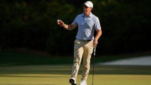 Rory McIlroy, of Northern Ireland, waves after his putt on the 13th hole during the final round of the Masters golf tournament at the Augusta National Golf Club, Sunday, April 12, 2026, in Augusta, Ga. (AP Photo/Ashley Landis)