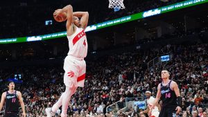 Toronto Raptors' Scottie Barnes (4) dunks against the Miami Heat during first half NBA action in Toronto on Tuesday, April 7, 2026. (CP/Frank Gunn)