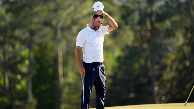 Scottie Scheffler finishes his final round of the Masters golf tournament at the Augusta National Golf Club, Sunday, April 12, 2026, in Augusta, Ga. (AP Photo/David J. Phillip)