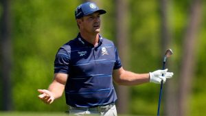 Bryson DeChambeau watches his tee shot on the 12th hole during the first round of the Masters golf tournament at the Augusta National Golf Club, Thursday, April 9, 2026, in Augusta, Ga. (AP Photo/Eric Gay)