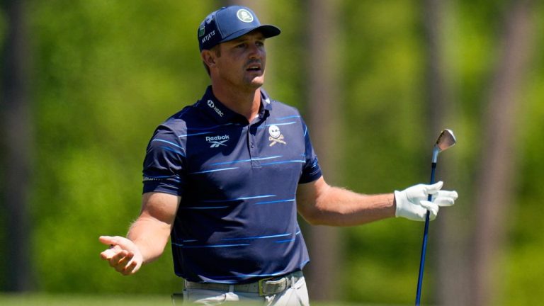 Bryson DeChambeau watches his tee shot on the 12th hole during the first round of the Masters golf tournament at the Augusta National Golf Club, Thursday, April 9, 2026, in Augusta, Ga. (AP Photo/Eric Gay)