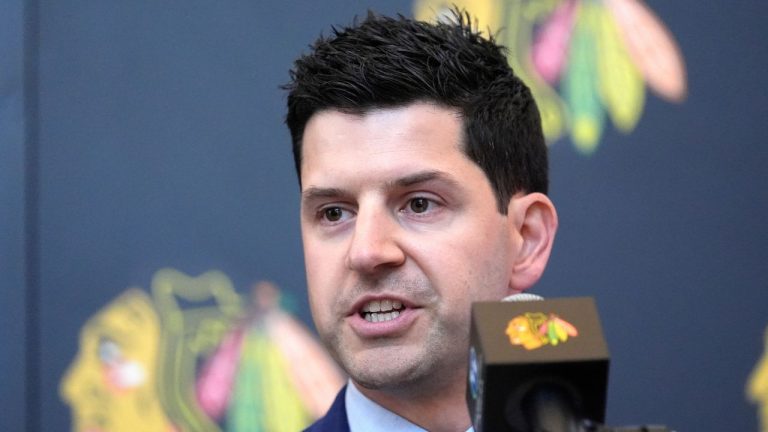 Chicago Blackhawks general manager Kyle Davidson speaks at a news conference during the team's NHL hockey camp Thursday, Sept. 19, 2024, in Chicago. (Charles Rex Arbogast/AP)