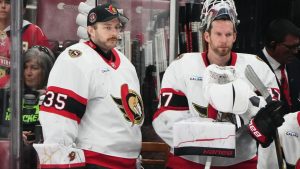 Ottawa Senators goaltenders Linus Ullmark (35) and James Reimer (47) watch from the bench during the third period of an NHL game against the Florida Panthers, Tuesday, March 31, 2026, in Sunrise, Fla. (AP Photo/Lynne Sladky)