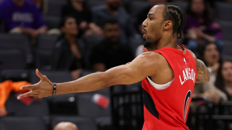 Toronto Raptors guard A.J. Lawson reacts after making a 3-point shot against the Sacramento Kings during the second half of an NBA basketball preseason game Wednesday, Oct. 8, 2025, in Sacramento, Calif. (AP Photo/Scott Marshall)