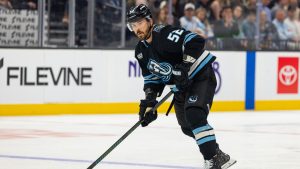 Utah Mammoth defenseman Mackenzie Weegar (52) moves the puck during the first period of an NHL hockey game against the Anaheim Ducks, Friday, March 20, 2026, in Salt Lake City. (Melissa Majchrzak/AP)