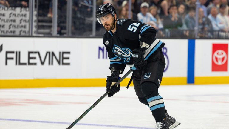 Utah Mammoth defenseman Mackenzie Weegar (52) moves the puck during the first period of an NHL hockey game against the Anaheim Ducks, Friday, March 20, 2026, in Salt Lake City. (Melissa Majchrzak/AP)