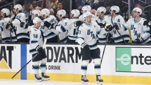 Utah Mammoth right wing Dylan Guenther (11), reacts after his goal against the Vegas Golden Knights during the second period in Game 2 of a first-round NHL hockey Stanley Cup playoff series Tuesday, April 21, 2026, in Las Vegas. (Ian Maule/AP)
