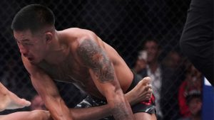 Joshua Van, right, fights Brandon Royval in a flyweight fight at UFC 317, Saturday, June 28, 2025, in Las Vegas. (John Locher/AP)