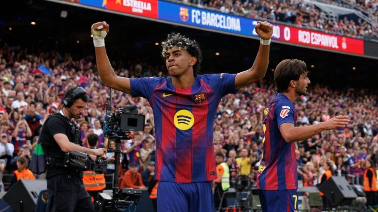 Barcelona's Lamine Yamal celebrates after Ferran Torres, right, scored their side's second goal during the Spanish La Liga match between Barcelona and Espanyol in Barcelona, Spain, Saturday, April 11, 2026. (AP/Joan Monfort)