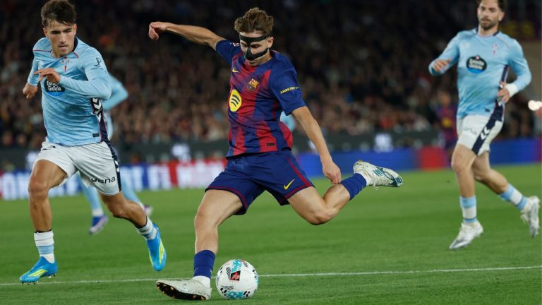 Barcelona's Fermin Lopez, centre, shoots the ball during the Spanish La Liga soccer match between Barcelona and Celta Vigo in Barcelona, Spain, Wednesday, April 22, 2026. (Joan Monfort/AP Photo)
