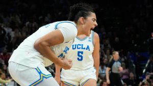 UCLA centre Lauren Betts (51) celebrates after a play against South Carolina during the second half of the women's National Championship Final Four NCAA college basketball tournament game, Sunday, April 5, 2026, in Phoenix. (Ross D. Franklin/AP)