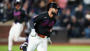 New York Mets' Bo Bichette runs to second base for a three-run double during the eighth inning of a baseball game against the Minnesota Twins Thursday, April 23, 2026, in New York. (Frank Franklin II/AP Photo)