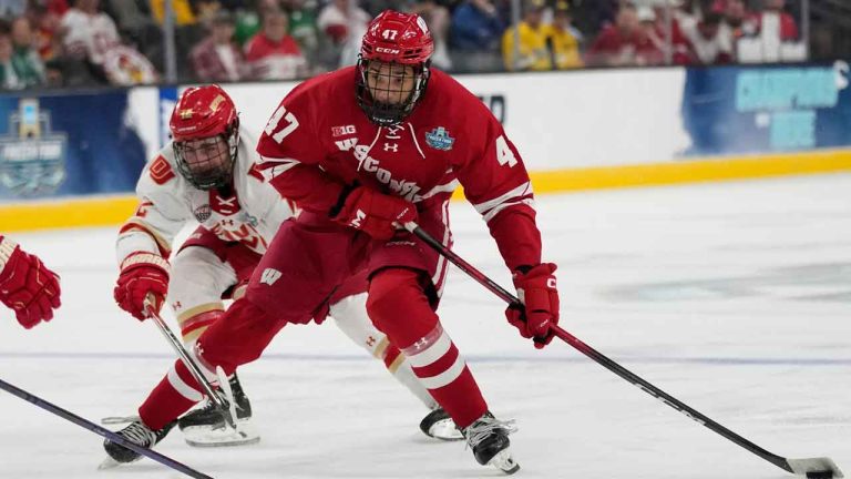 Wisconsin forward Blake Montgomery (47) shoots against Denver in the second period of the championship game at the NCAA Frozen Four men's college hockey tournament. (John Locher/AP)