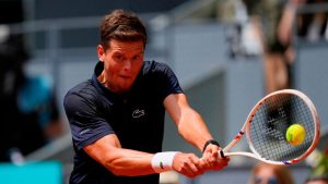 Alexander Blockx of Belgium returns the ball to Casper Ruud of Norway during the quarterfinal match at the Madrid Open tennis tournament in Madrid, Thursday, April 30, 2026. (Jose Breton/AP Photo)