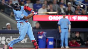 Toronto Blue Jays first baseman Vladimir Guerrero Jr. (27) hits an RBI single during fifth inning MLB baseball action against the Boston Red Sox, in Toronto on Tuesday, April 28, 2026. (Nathan Denette/CP)