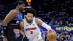 Detroit Pistons guard Cade Cunningham (2) drives against Orlando Magic centre Wendell Carter Jr. (34) during the first half in Game 5 of a first-round NBA basketball playoffs series Wednesday, April 29, 2026, in Detroit. (Duane Burleson/AP)