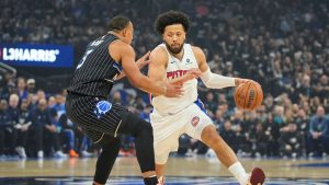 Detroit Pistons guard Cade Cunningham, right, drives around Orlando Magic guard Desmond Bane during the first half in Game 3 of a first-round NBA basketball playoff series, Saturday, April 25, 2026, in Orlando, Fla. (John Raoux/AP)