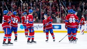 Montreal Canadiens' Cole Caufield (centre) celebrates with teammate after the Montreal Canadiens defeated the Tampa Bay Lightning in NHL hockey action, in Montreal on Thursday, April 9, 2026. (Christopher Katsarov/CP)