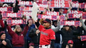 Cleveland Guardians third baseman José Ramírez holds the base after being presented with it after the fifth inning of a baseball game against the Kansas City Royals to commemorate his record 1,620 games as a Cleveland Indian/Cleveland Guardian in Cleveland, Monday, April 6, 2026. (Sue Ogrocki/AP)