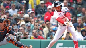 Boston Red Sox' Ceddanne Rafaela hits a two run pinch hit single down the right field line in the seventh inning during a baseball game against the Detroit Tigers, Monday, April 20, 2026 in Boston. (Jim Davis/AP)