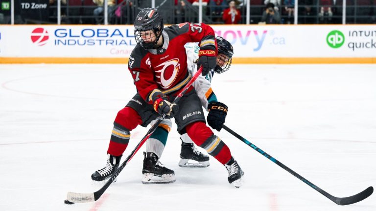 Ottawa Charge's Rebecca Leslie (37) works under pressure from New York Sirens' Nicole Vallario (11) during first period PWHL hockey action in Ottawa, on Saturday, April 18, 2026. (Spencer Colby/THE CANADIAN PRESS)