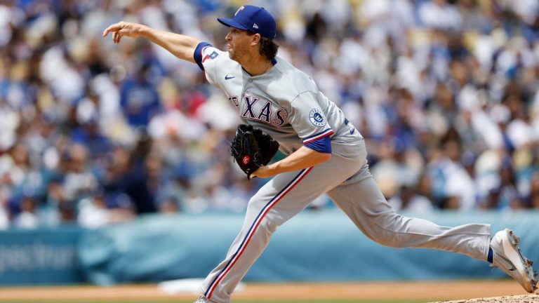 Texas Rangers starting pitcher Jacob deGrom releases a pitch during the first inning of a baseball game against the Los Angeles Dodgers, Sunday, April 12, 2026, in Los Angeles. (AP/Caroline Brehman)