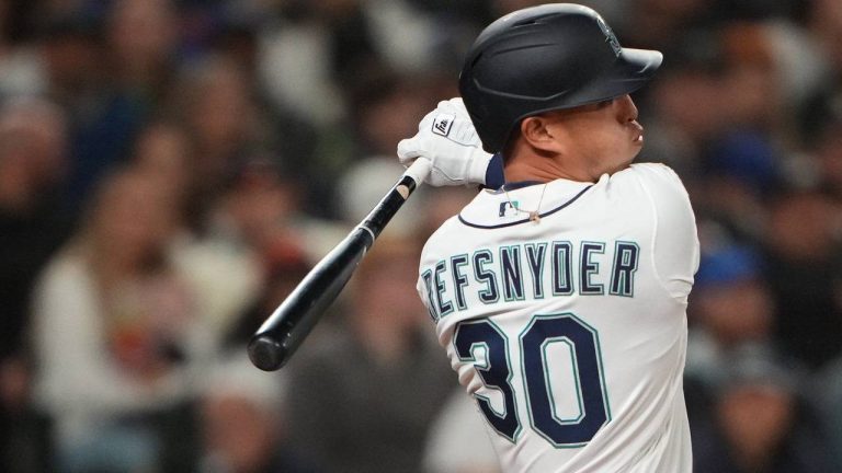 Seattle Mariners' Rob Refsnyder follows through against the Houston Astros during a baseball game, Saturday, April 11, 2026, in Seattle. (Lindsey Wasson/AP)