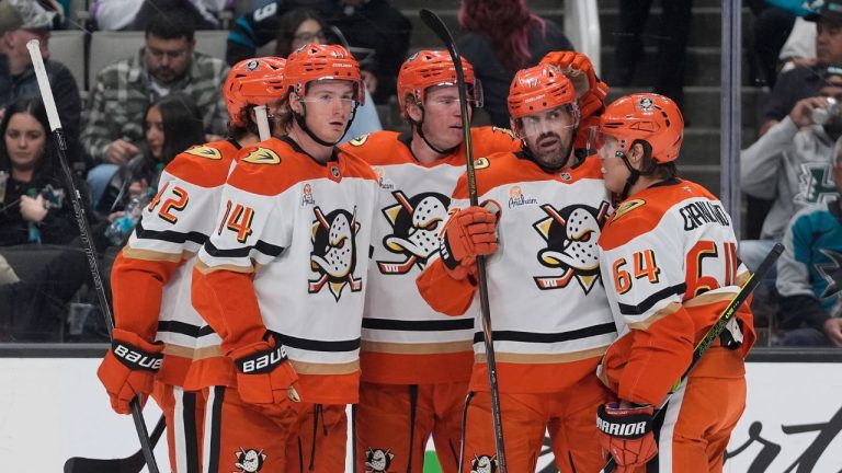 Anaheim Ducks left wing Alex Killorn, second from right, is congratulated by teammates after scoring against the San Jose Sharks during the second period of an NHL hockey game in San Jose, Calif., Wednesday, April 1, 2026. (Jeff Chiu/AP Photo)