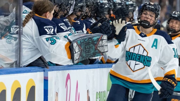 New York Sirens' Sarah Fillier (10) celebrates her goal against the Vancouver Goldeneyes with her teammates during the first period of a PWHL hockey game in Vancouver, on Wednesday, March 18, 2026. (Ethan Cairns/CP)