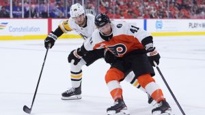 Philadelphia Flyers' Luke Glendening, right, tries to keep the puck away from Pittsburgh Penguins' Parker Wotherspoon during the second period of Game 3 in the first round of the NHL Stanley Cup hockey playoffs Wednesday, April 22, 2026, in Philadelphia. (Matt Slocum/AP)
