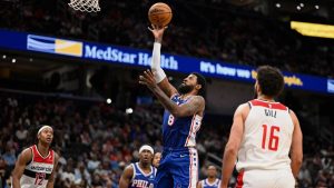 Philadelphia 76ers forward Paul George (8) goes to shoot during the second half of an NBA basketball game against the Washington Wizards, Wednesday, April 1, 2026, in Washington. (John McDonnell/AP)