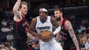 Toronto Raptors centre Jakob Poeltl (19) and Toronto Raptors forward Sandro Mamukelashvili (54) defend Memphis Grizzlies forward GG Jackson II (45) during the second half of an NBA basketball game Friday, April 3, 2026, in Memphis, Tenn. (Nikki Boertman/AP Photo)