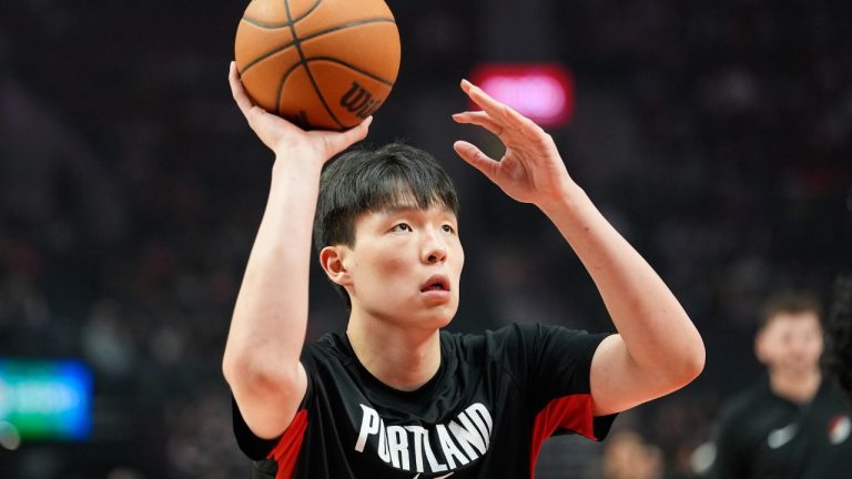 Portland Trail Blazers centre Yang Hansen warms up before an NBA basketball game against the Brooklyn Nets, Monday, March 23, 2026, in Portland, Ore. (Jenny Kane/AP)