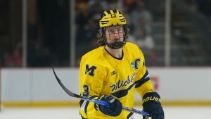 Michigan forward T.J. Hughes (13) during an NCAA hockey regional game against Bentley, Friday, March 27, 2026 in Albany, N.Y. Michigan won 5-1. (Vera Nieuwenhuis/AP Photo)