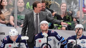 Winnipeg Jets head coach Scott Arniel, centre, gives instructions on the bench in the third period of an NHL game against the Dallas Stars Thursday, April 2, 2026, in Dallas. (Tony Gutierrez/AP)