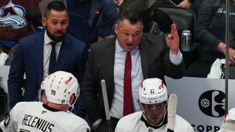 Los Angeles Kings interim coach D.J. Smith talks with centre Samuel Helenius (79) during the first period of Game 2 in the first round of the NHL Stanley Cup Playoffs against the Colorado Avalanche, Tuesday, April 21, 2026, in Denver. (Jack Dempsey/AP)