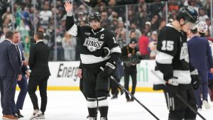 After the final game of his career, Los Angeles Kings' Anze Kopitar, center, waves to the fans following Game 4 in the first round of an NHL hockey Stanley Cup playoff series against the Colorado Avalanche, Sunday, April 26, 2026, in Los Angeles. (Scott Strazzante/AP)