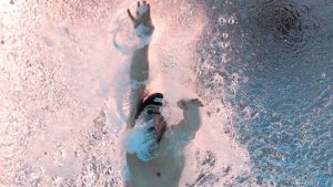 Neutral Athlete Russia, Egor Kornev competes in the men's 50-meter freestyle heat at the World Aquatics Championships in Singapore, Friday, Aug. 1, 2025. (Lee Jin-man/AP)