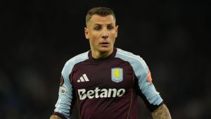 Aston Villa's Lucas Digne gestures during the Europa League quarterfinal second leg soccer match between Aston Villa and Bologna, in Birmingham, England, Thursday, April 16, 2026. (Dave Shopland/AP)