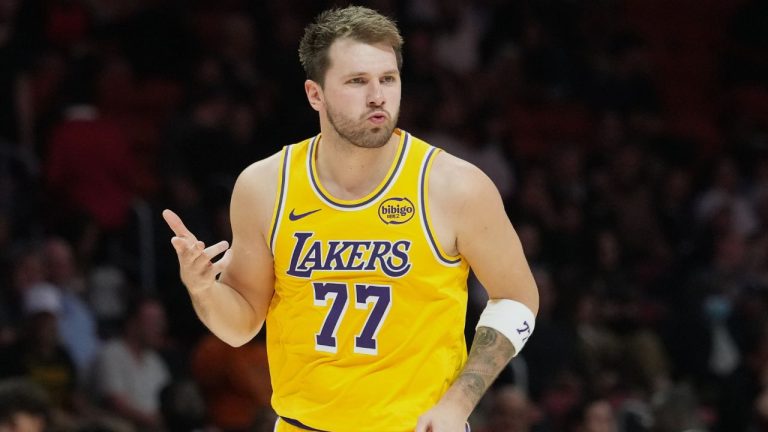 Los Angeles Lakers guard Luka Doncic (77) reacts after scoring during the second half of an NBA basketball game against the Miami Heat, Thursday, March 19, 2026, in Miami. (Lynne Sladky/AP)