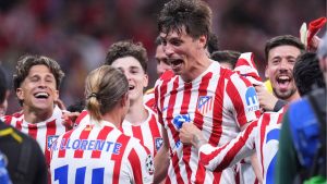 Atletico Madrid's players celebrate at the end of the Champions League quarterfinal second leg soccer match between Atletico Madrid and Barcelona in Madrid, Spain, Tuesday, April 14, 2026. (Manu Fernandez/AP Photo)