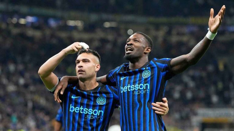 Inter Milan's Lautaro Martinez, left, and Inter Milan's Marcus Thuram react during the Serie A soccer match between Inter Milan and Roma. (Luca Bruno/AP)