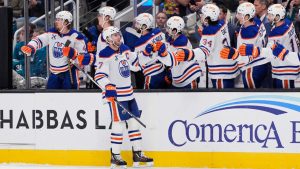 Edmonton Oilers center Connor McDavid (97) celebrates with teammates after scoring a goal during the first period of an NHL hockey game against the San Jose Sharks, Wednesday, April 8, 2026, in San Jose, Calif. (Godofredo A. Vásquez/AP)