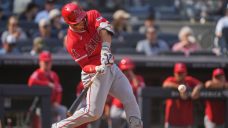 Trout homers again as Angels outslug Yankees to split series
