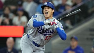 Los Angeles Dodgers two-way player Shohei Ohtani (17) reacts to a wild pitch from the Toronto Blue Jays during first inning Inter League MLB baseball action in Toronto on Wednesday, April 8, 2026. (Nathan Denette/THE CANADIAN PRESS)