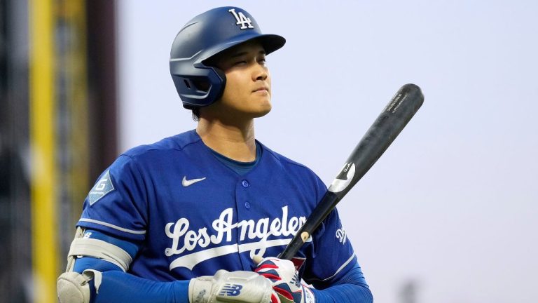 Los Angeles Dodgers' Shohei Ohtani walks to the dugout after striking out during the fifth inning of a baseball game against the San Francisco Giants, Wednesday, April 22, 2026, in San Francisco. (Tony Avelar/AP Photo)