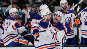 Edmonton Oilers center Connor McDavid, right, celebrates with defenseman Evan Bouchard (2) after scoring a goal during the second period of an NHL hockey game against the San Jose Sharks, Wednesday, April 8, 2026, in San Jose, Calif. (Godofredo A. Vásquez/AP)