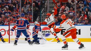 Anaheim Ducks' Ryan Poehling (25) celebrates a goal against Edmonton Oilers goaltender Connor Ingram (39) during second period NHL playoff action in Edmonton on Wednesday, April 22, 2026. (Codie McLachlan/CP)