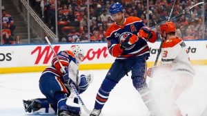 Anaheim Ducks' Ian Moore (3) can't get a shot past Edmonton Oilers' Darnell Nurse (25) and goaltender Connor Ingram (39) during first period NHL playoff action in Edmonton on Wednesday, April 22, 2026. (Codie McLachlan/CP)